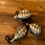 Briquet à gaz flamme rouge motif Grenade